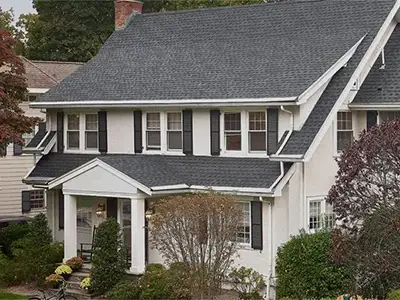 Home with a gray shingle roof